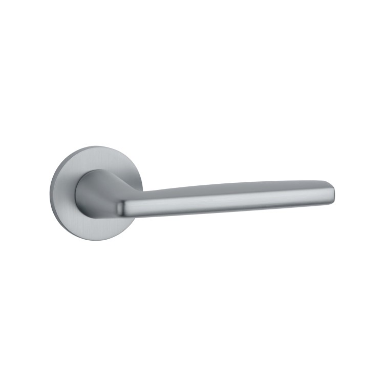 Klamka APRILE LUNA ROZETA R SLIM 7MM MSC - chrom satynowy .Waga netto 1,004kg  Kod EAN 5902249338546  Grubość rozety 7 mm  Kolekcja Comfort  Kolor Chrom satynowy  Kształt rozety Okrągła R SLIM 7 mm , fi 53 mm Producent ENGER  Marka APRILE  Materiał Cynk
